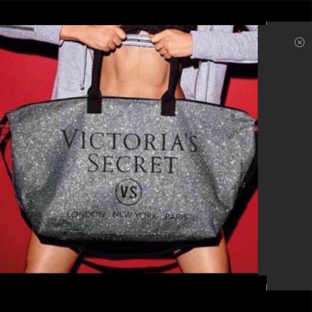 EUC Victoria’s secret Silver and black duffel bag